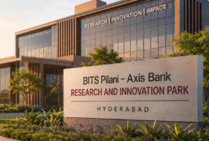 A modern innovation park concept in Hyderabad featuring advanced research facilities, technology labs, healthcare innovation centers, and startup workspaces, highlighting the ₹100 crore collaboration between BITS Pilani Hyderabad Campus and Axis Bank, with TVN99 branding displayed.