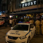 Hyderabad police outside a Raidurgam pub after an alleged gun scare following a dispute between two groups.