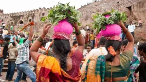 Bonalu Festival 2026 preparations underway in Telangana with devotees carrying traditional Bonam offerings at Golconda Fort ahead of celebrations beginning on July 16.